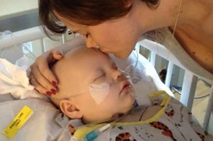 Hazel gets kiss from mom